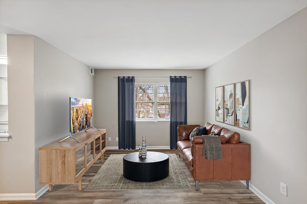 Living room with window at Villages at Marley Station in Glen Burnie MD